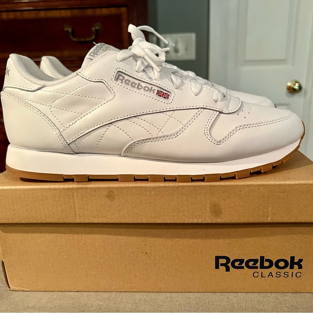 Women’s White Reebok Classics w/Gum Sole. Worn one time.